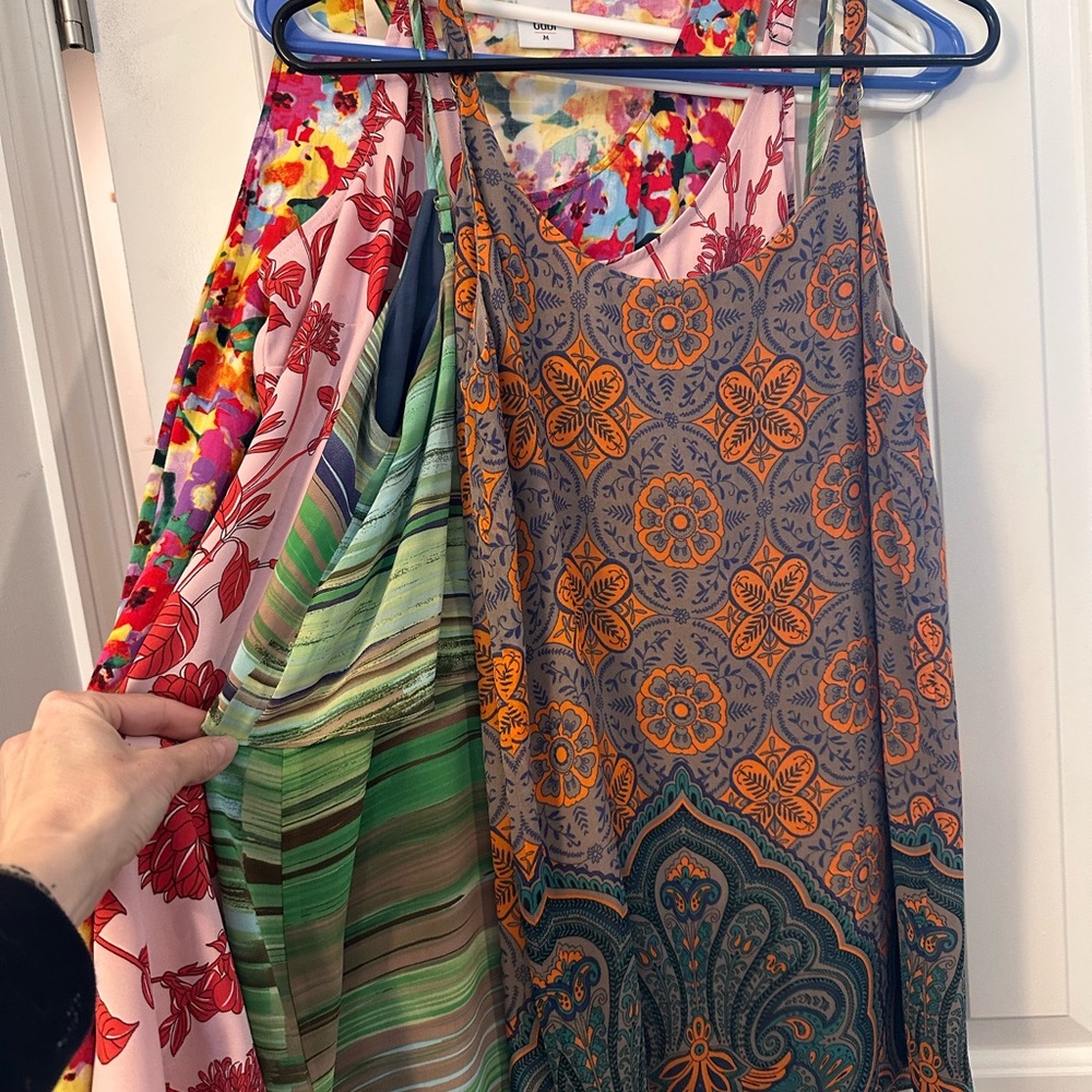 Four tops, all Cabi brand.   All size medium